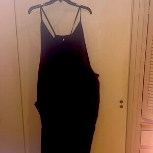 Size 3X lightweight maybe polyester overalls with pockets  and little zip pocket